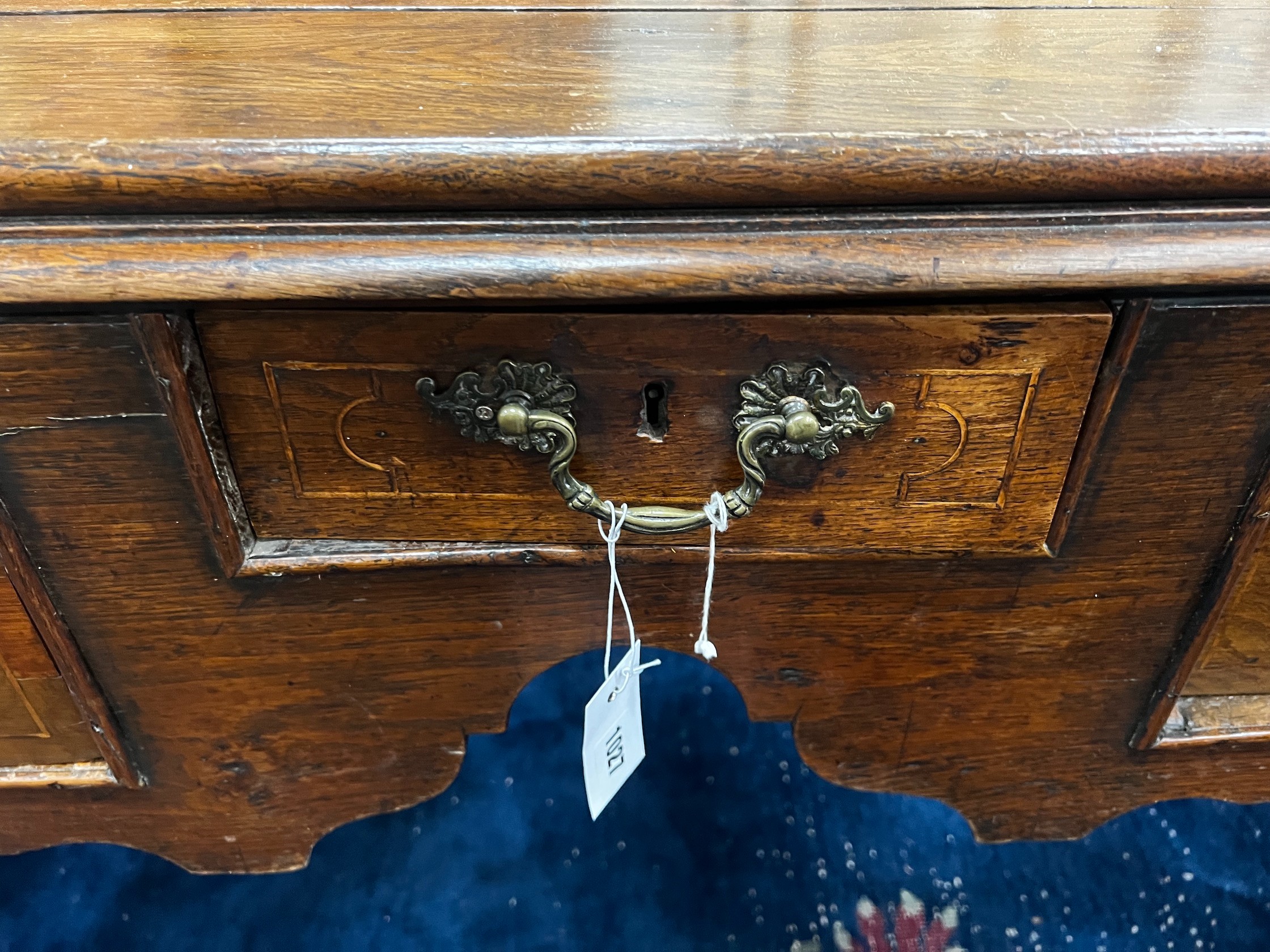 A George III and later oak kneehole table, converted from a stand, width 100cm depth 65cm height 74cm